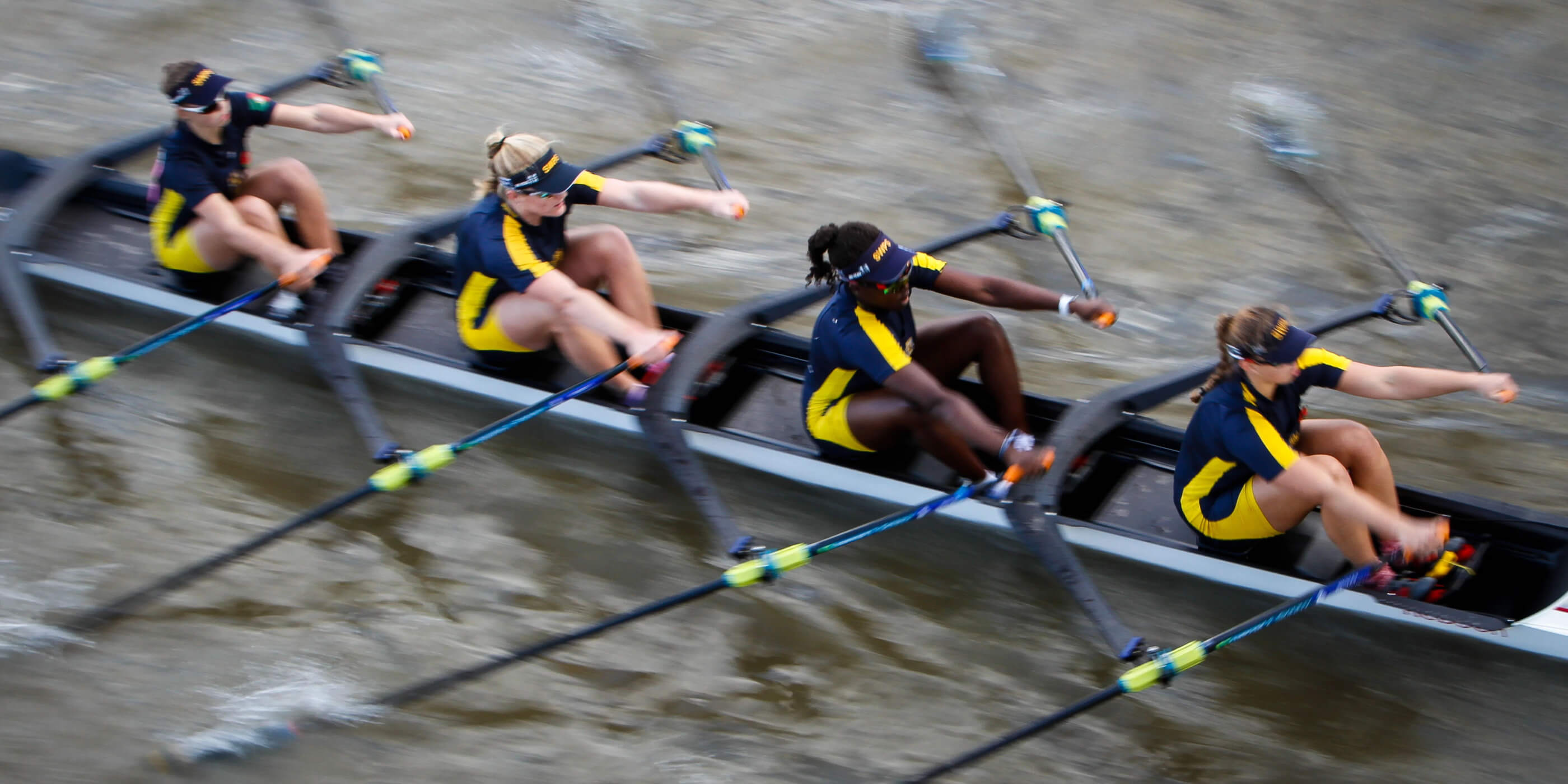 Rowers wearing customisable rowing kit from Crewroom Clothing.