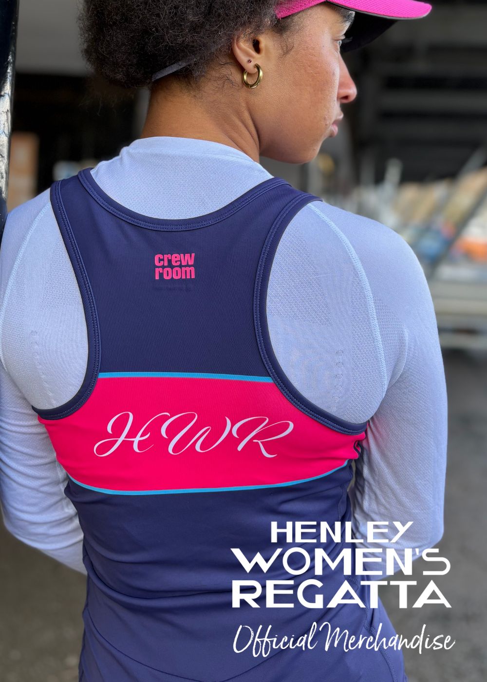 Person wearing a Henley Women's Regatta branded athletic outfit with pink and blue design.
